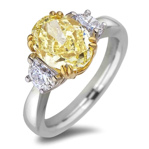 3.42 Carat GIA Fancy Yellow Oval Diamond Trilogy Engagement Ring in 18K White and Yellow Gold - Image 2