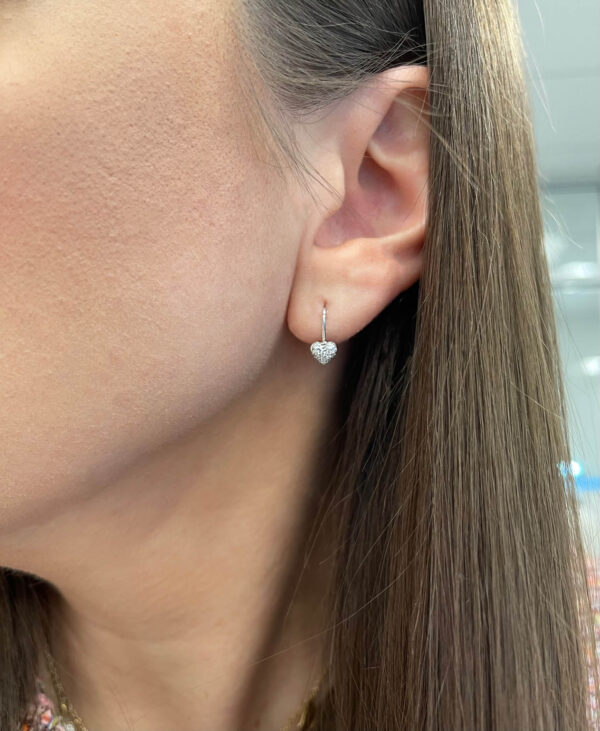 0.21 CTW Diamond Heart Hook Style Earrings in White Gold on ear