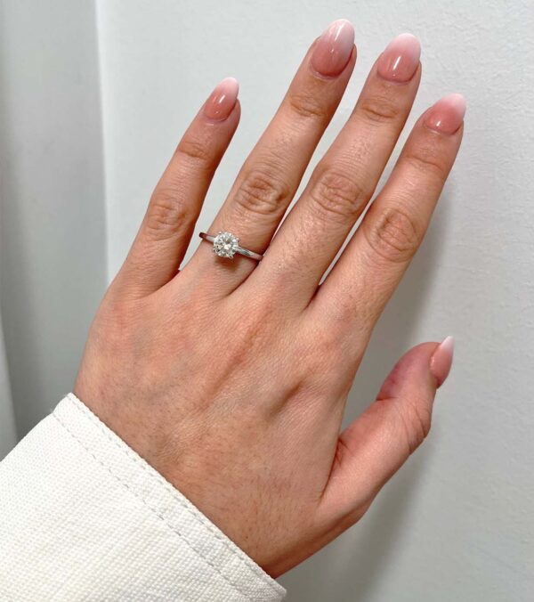 1 carat solitaire diamond engagement ring GIA certificate 1 carat diamond on finger