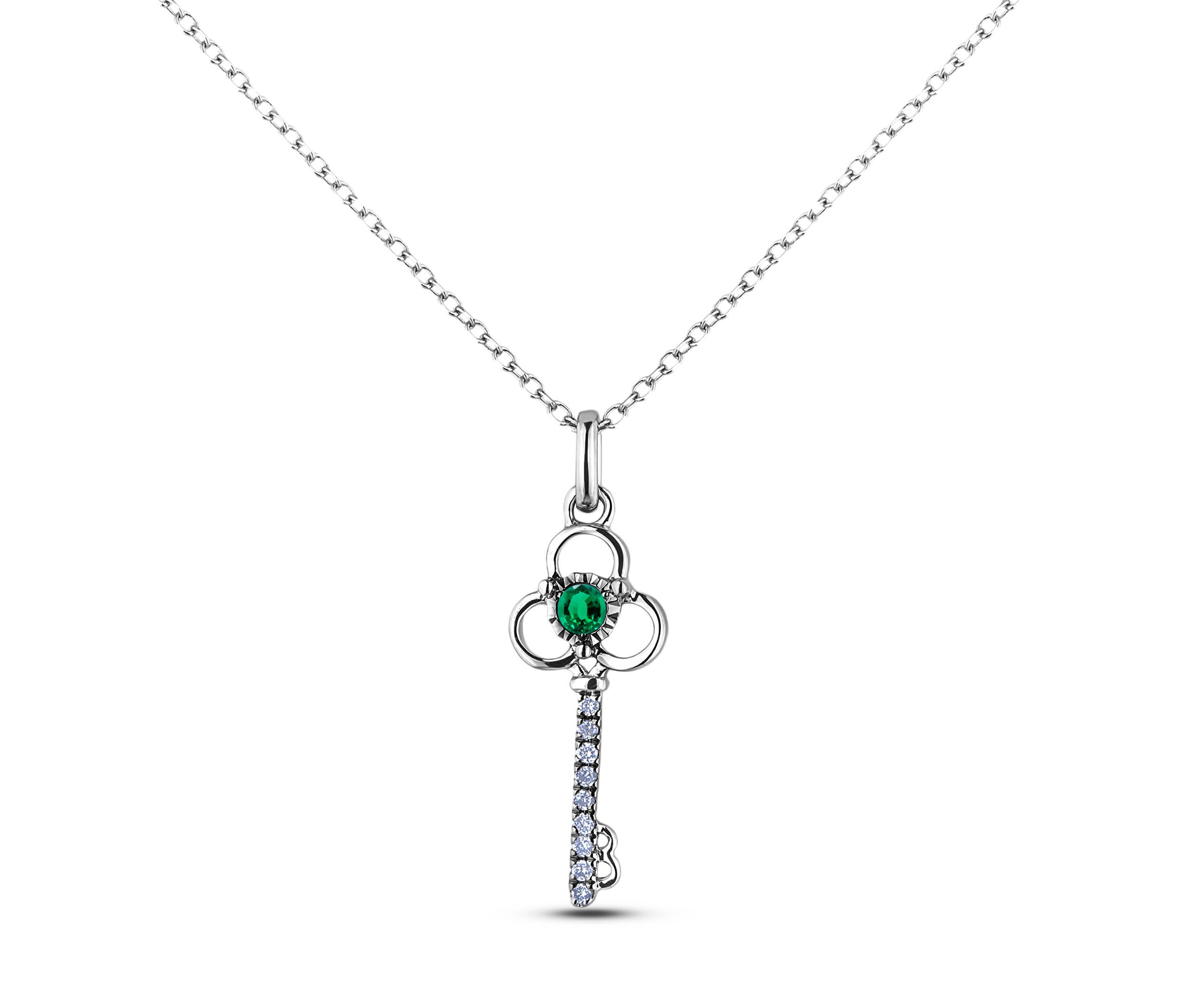 0.04 Carat Emerald Diamond Key Pendant in White Gold