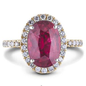 3.26 Carat Oval Cut Ruby and Canadian Diamond Halo Ring in Yellow Gold