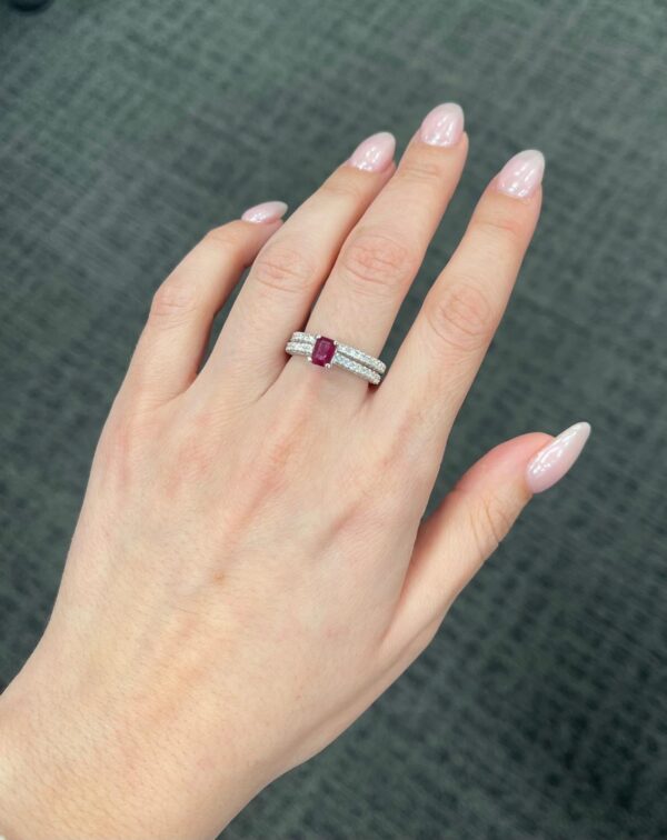 0.54 Carat Emerald Cut Ruby and Hidden Diamond Ring in 18K White Gold ring on finger model