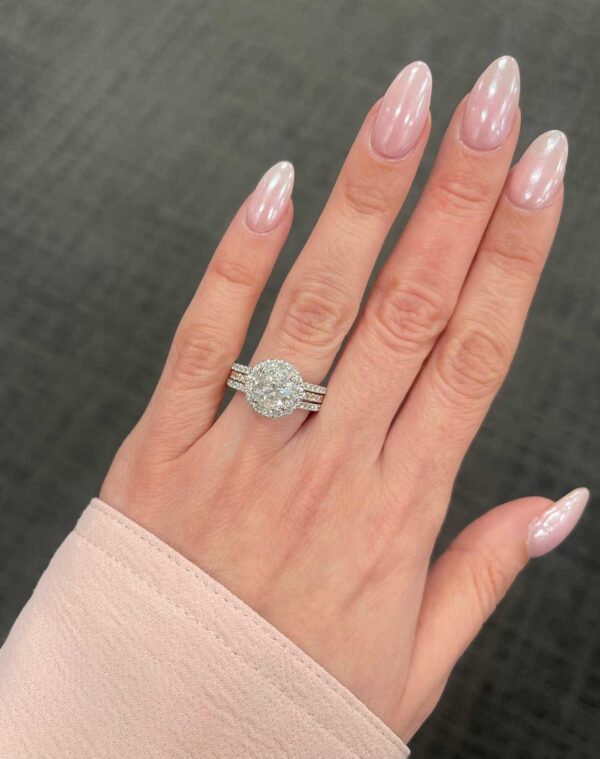 1.87 Carat Canadian Diamond Triple Row Engagement Ring with Hidden Details in 18K Rose and White Gold ring on finger