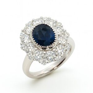 Oval Sapphire and De Beers Forevermark Diamond Halo Statement Ring in 18K White Gold