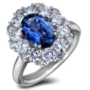 Oval Shaped Blue Sapphire and De Beers Forevermark Diamond Halo Statement Ring in 18K White Gold