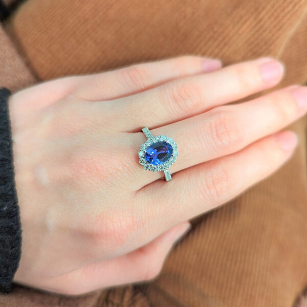 1.64 Carat Oval Shaped Tanzanite & Diamond Halo Ring in 14K White Gold