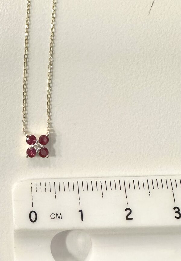 Flower Pendant Set With Ruby And Diamond In Yellow Gold