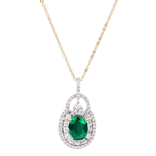 1.36 Carat Oval Shape Emerald and Diamond Halo Vintage Style Pendant in 18K White And Yellow Gold
