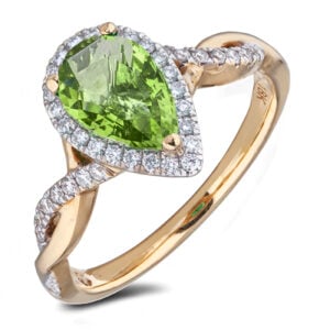 Pear Shaped Peridot and Diamond Twist Ring in Yellow Gold