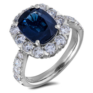 Cushion Cut Sapphire and De Beers Forevermark Diamonds Halo Ring in 18K White Gold