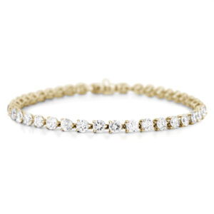 Three-Claw Diamond Tennis Bracelet In Yellow Gold