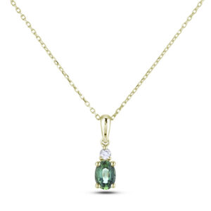 Oval Shaped Emerald and Diamond Pendant In 18K Yellow Gold