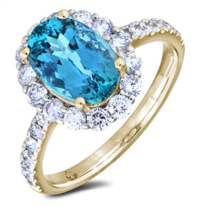Oval Topaz and Canadian Diamond Halo Ring in Yellow Gold