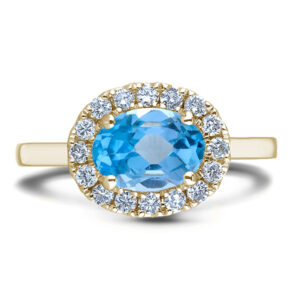 Oval Shaped Blue Topaz and Canadian Diamond Halo Ring in Yellow Gold
