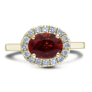 Oval Shaped Garnet and Canadian Diamond Halo Ring in Yellow Gold