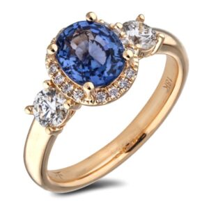 Madasgascar Oval Sapphire and De Beers Forevermark Diamond Halo Ring in 18K Yellow Gold