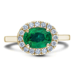 Oval Shaped Emerald and Canadian Diamond Halo Ring in Yellow Gold