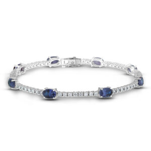 Oval Sapphire and Canadian Diamond Tennis Bracelet in White Gold