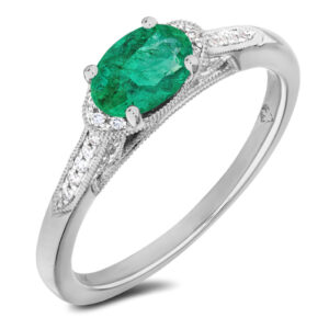 Oval Cut Emerald and Canadian Diamond Ring in White Gold | 0.58 Carat