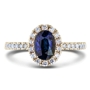 1.30 Carat Oval Cut Sapphire and Canadian Diamond Halo Ring In Yellow Gold