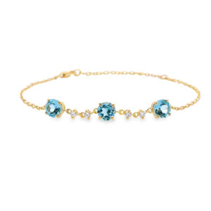 Blue Topaz and Canadian Diamond Dainty Bracelet in Yellow Gold