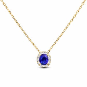 Oval Shaped 1.13 Carat Blue Sapphire and Canadian Diamond Halo Pendant In Yellow Gold