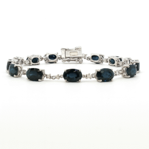 Oval Blue Sapphire & Canadian Diamond Tennis Bracelet in White Gold