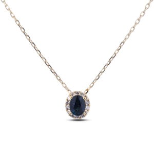 Oval Shape Ceylon Origin Blue Sapphire and Canadian Diamond Halo Pendant in Yellow and White Gold