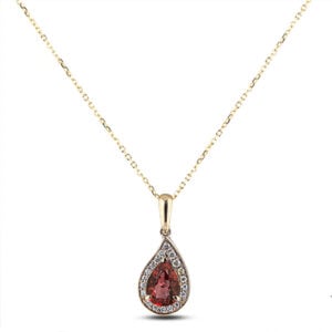 Garnet and Canadian Diamond Halo Pendant in Yellow Gold
