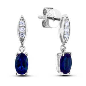 Oval Shaped Sapphire and Diamond Dangle Earrings in White Gold