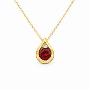 Canadian Diamond and Garnet Pear Shaped Pendant In Yellow Gold