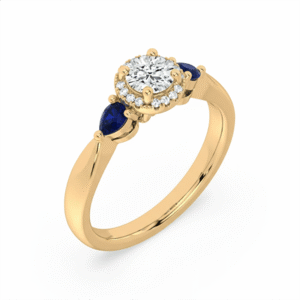 Canadian Diamond Halo Ring With Pear Shaped Blue Sapphire in Yellow Gold