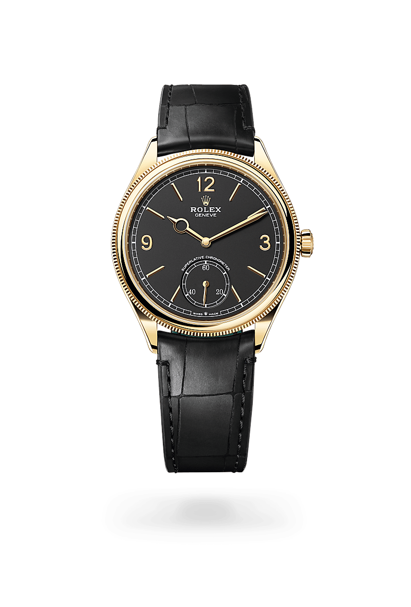 Rolex 1908 in 18 ct yellow gold with Intense black dial, Domed and fluted bezel, and Leather strap bracelet