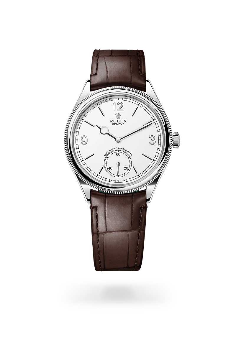 Rolex 1908 in 18 ct white gold with Intense white dial, Domed and fluted bezel, and Leather strap bracelet