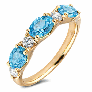 Blue Topaz and Diamond Anniversary Ring In Yellow Gold