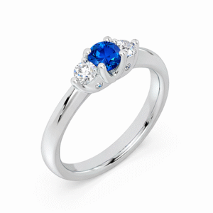 Blue Sapphire and Diamond Three Stone Ring With Hidden Details in 18K White Gold