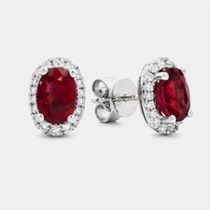 Oval Shape Halo Ruby & Diamond Stud Earrings in 18K White Gold