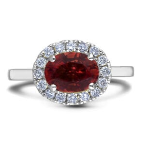 Oval Shaped Garnet and Canadian Diamond Halo Ring in White Gold