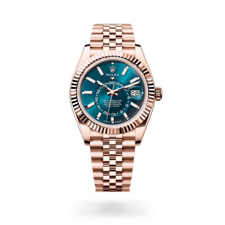 Rolex Sky-Dweller in 18 ct Everose gold with Blue-green dial, Fluted, bidirectional rotatable Rolex Ring Command bezel, and Jubilee, five-piece links bracelet