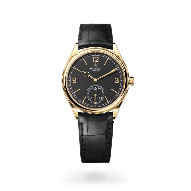 Rolex 1908 in 18 ct yellow gold with Intense black dial, Domed and fluted bezel, and Leather strap bracelet