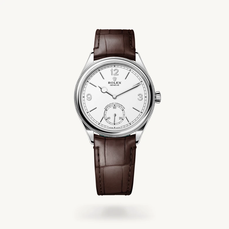 Rolex 1908 in 18 ct white gold with Intense white dial, Domed and fluted bezel, and Leather strap bracelet